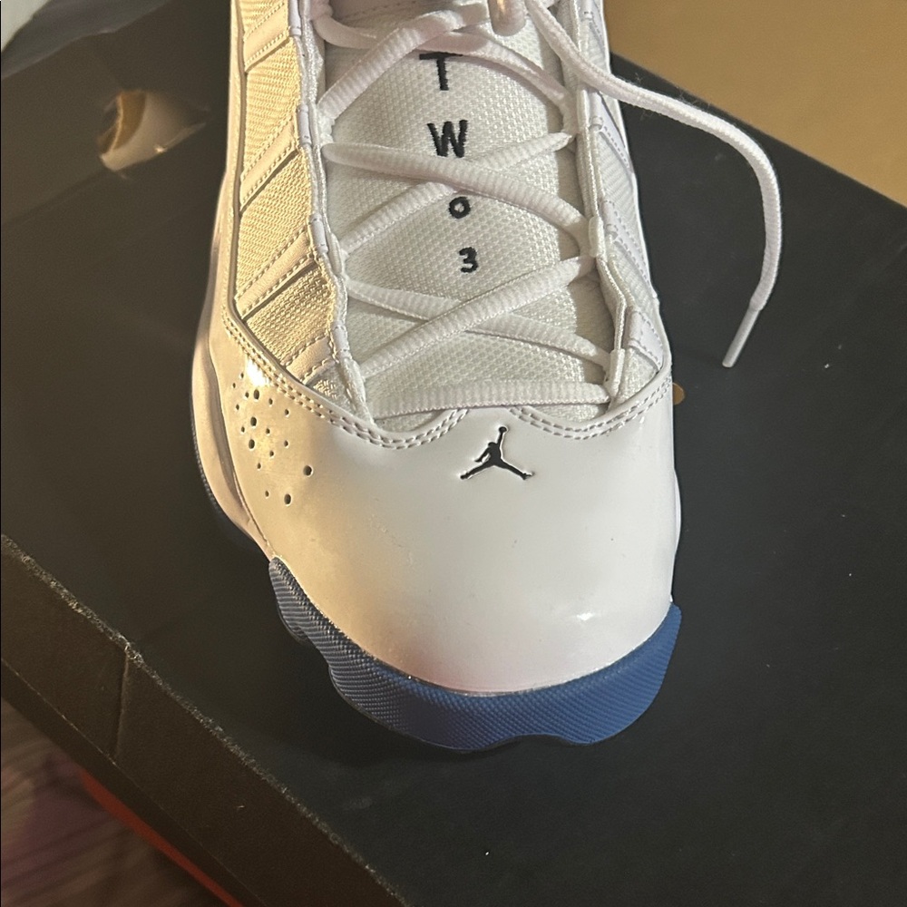 Jordan White and Blue High-Top Sneakers